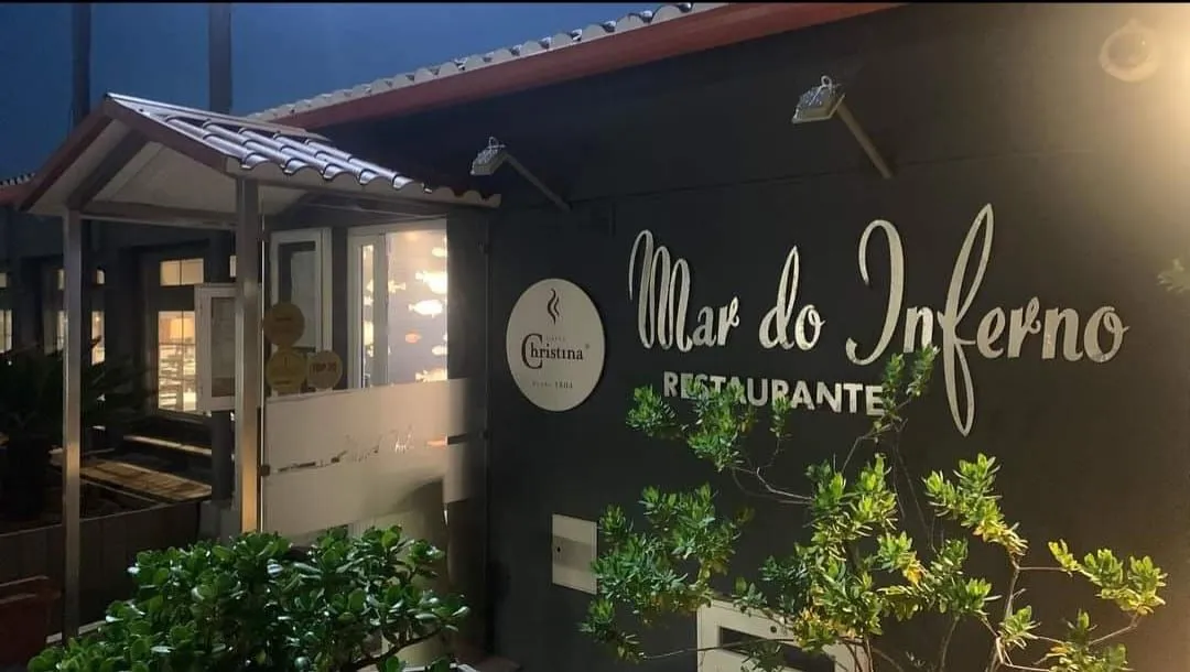Mar do Inferno restaurant sign and illuminated entrance